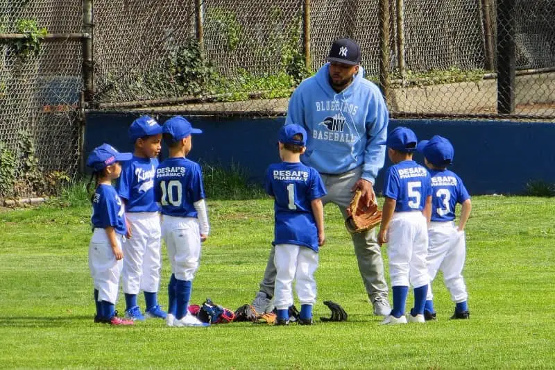 Baseball coach with kids | How to become a youth sports coach