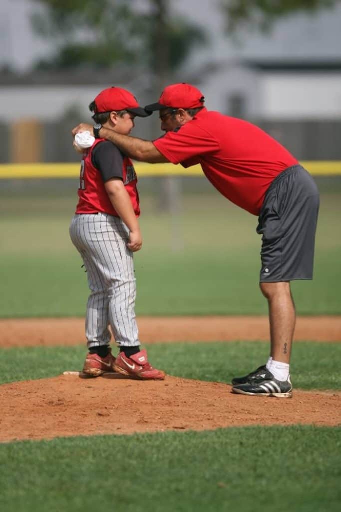 Coaching looking to the eyes of this player on baseball pitch | When to Stop Coaching Your Child? 5 Signs To Be Aware Of