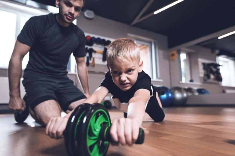 Young boy using roller | Challenges of Coaching Youth Sports: How to Come Out On Top