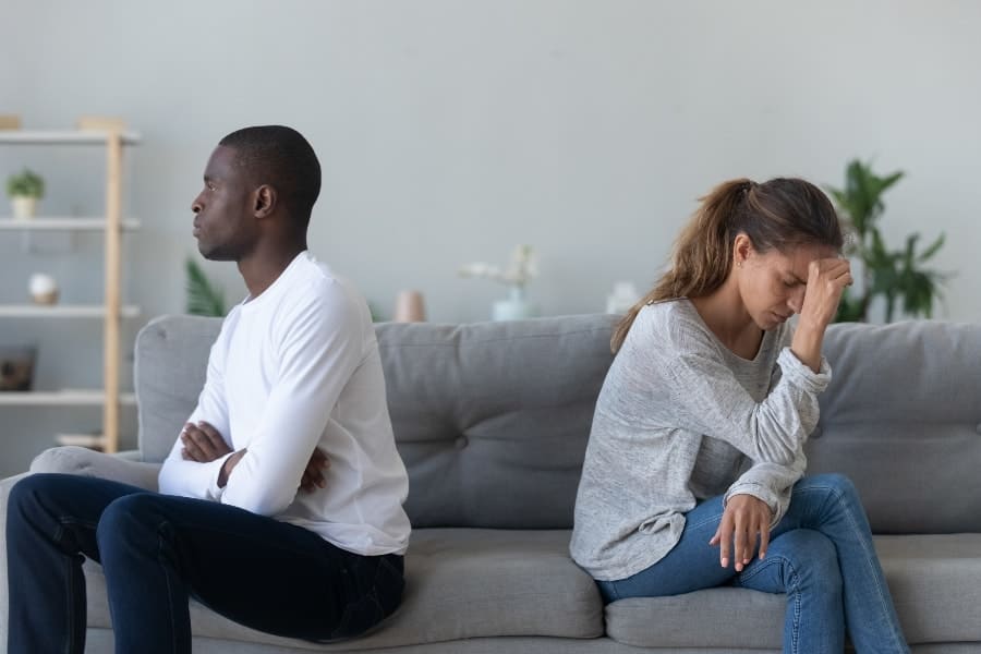 Man and women ignoring each other | My Husband Is a Coach and I Hate It. But Is All Hope Lost?