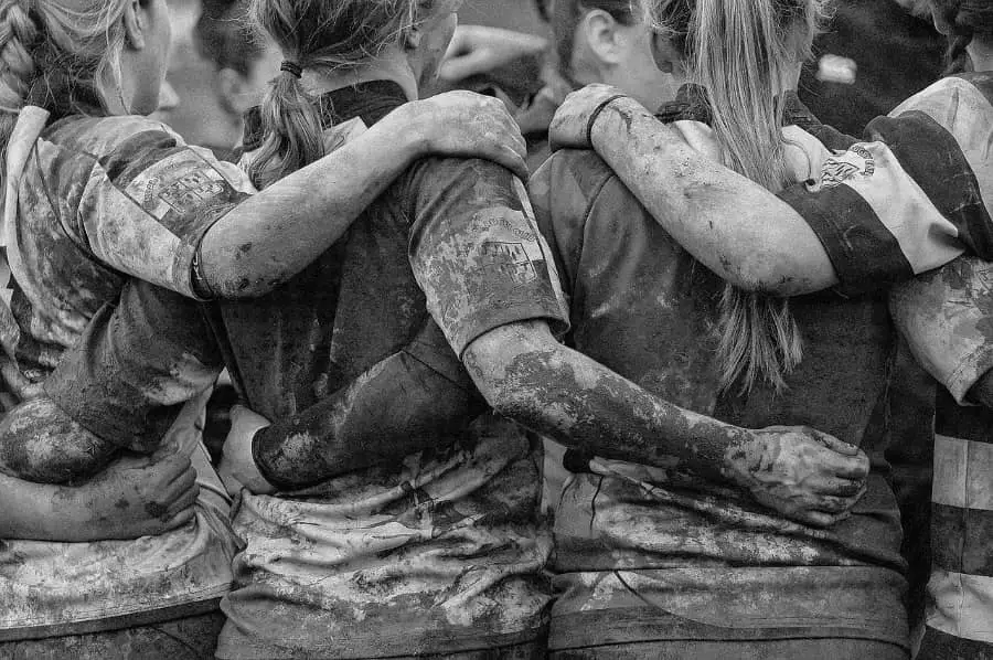 Muddy female athletes