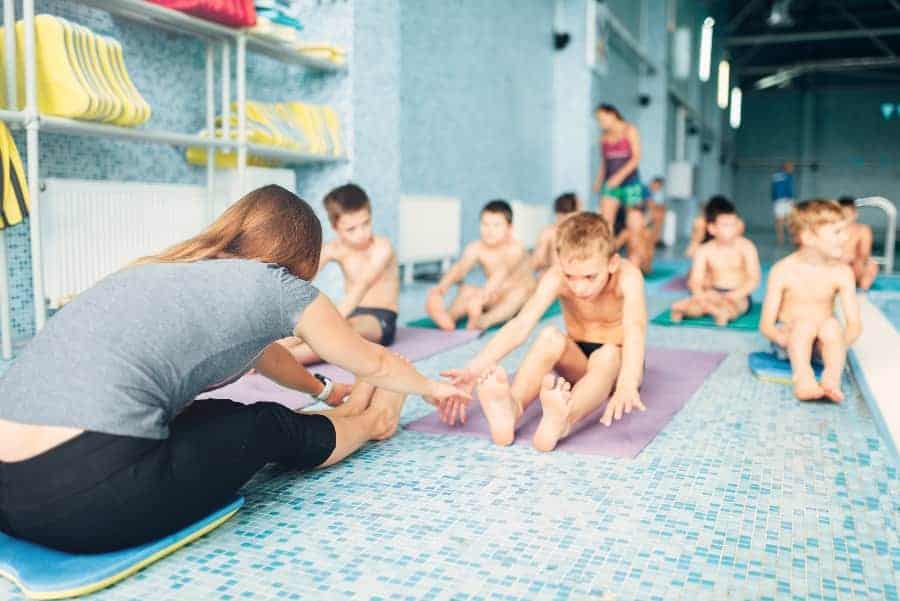 Swimming stretching | How Can Poor Coaching Cause Injuries in Youth Sports?